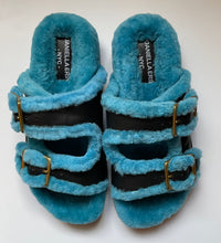 Women and Men’s Shearling and Leather Slides